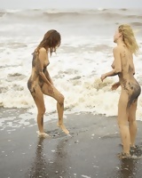 Clover and Natalia - A black beach bali